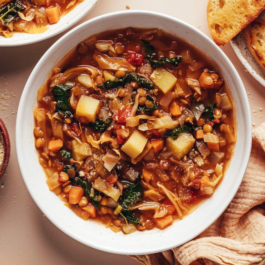 Overhead shot of a bowl of cabbage, fennel, and lentil soup