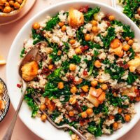 Overhead photo of a bowl of our hearty Lemon Quinoa Kale Salad with Crispy Chickpeas