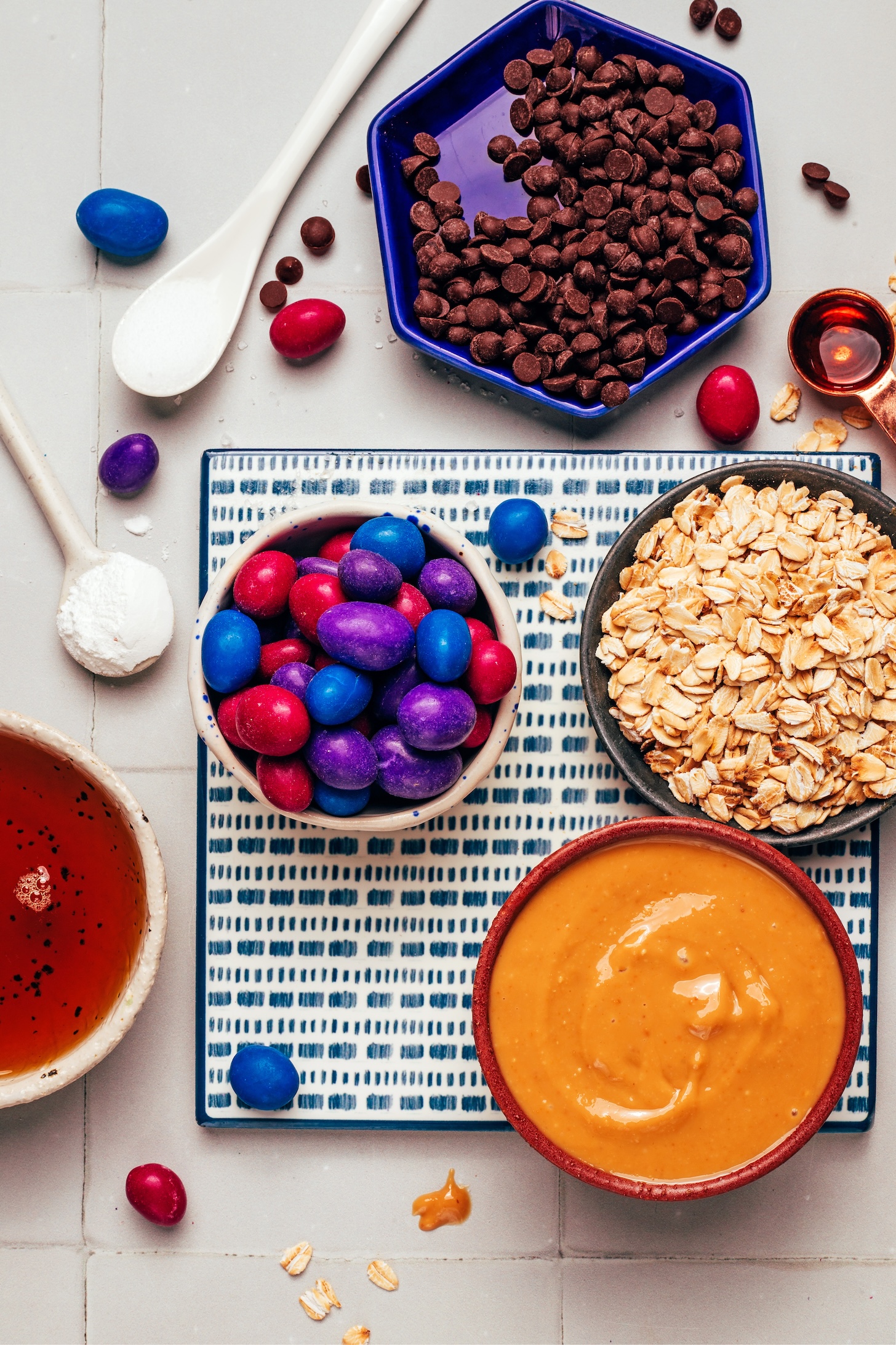 Mini chocolate chips, vanilla, rolled oats, creamy peanut butter, chocolate peanut candies, maple syrup, baking soda and baking powder