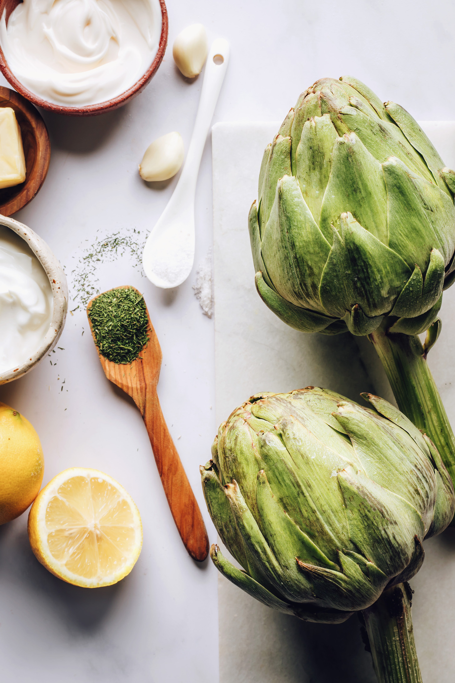 Artichokes and ingredients for making sauces for dipping