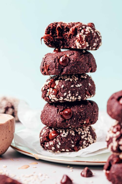 Plate with a tall stack of vegan gluten-free chocolate tahini cookies