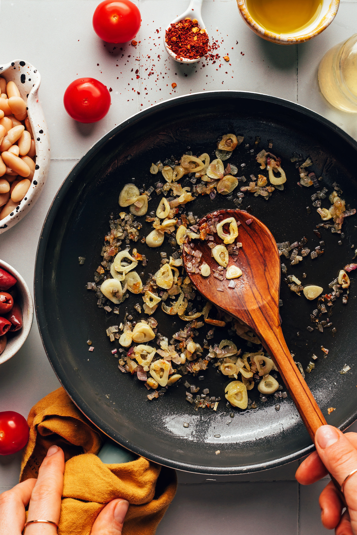 Sautéing garlic and shallots in a skillet