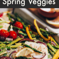 Sheet pan of easy baked cod with spring vegetables